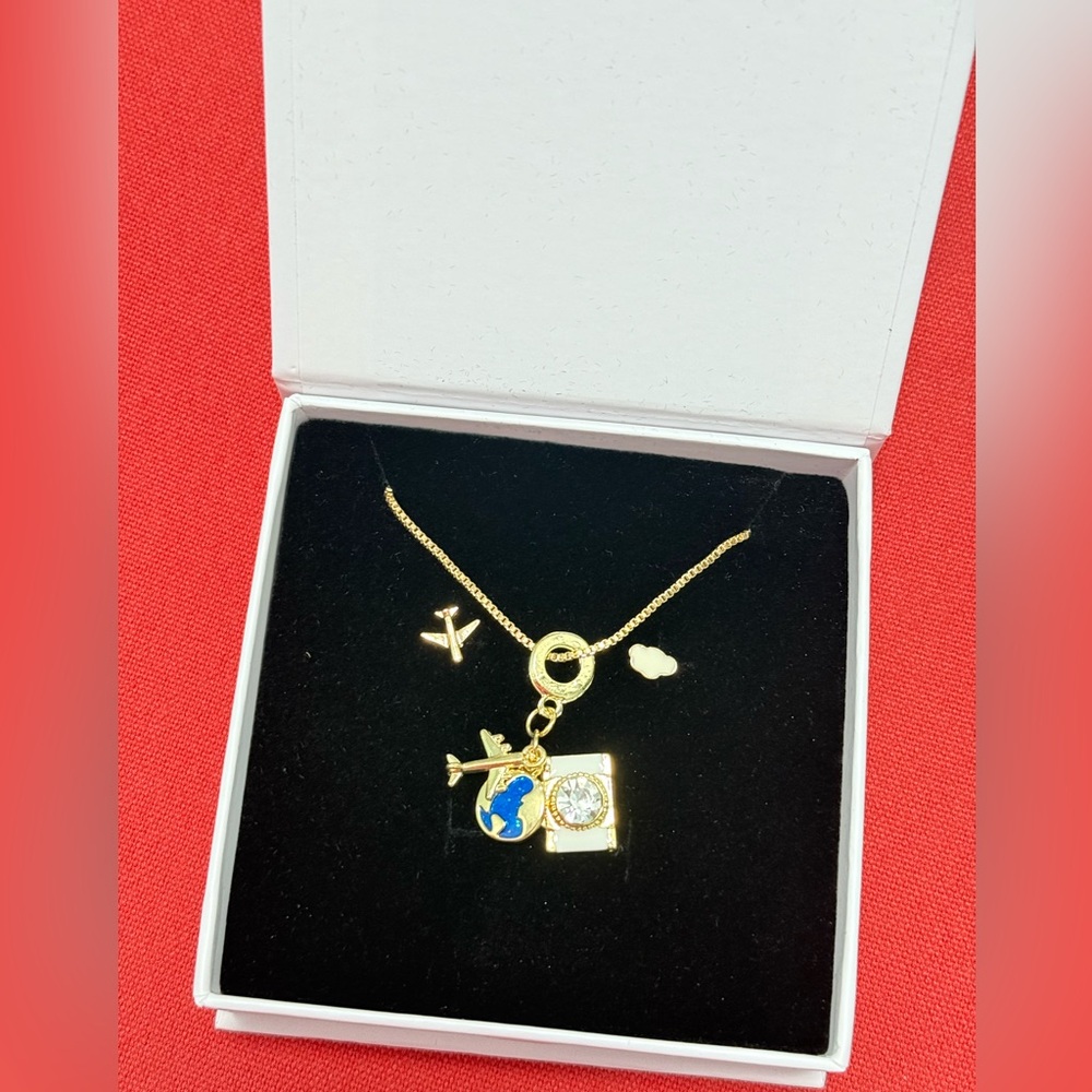 BOGO Sale 2 x $20 
Gold Travel Charm Necklace and Earrings Set